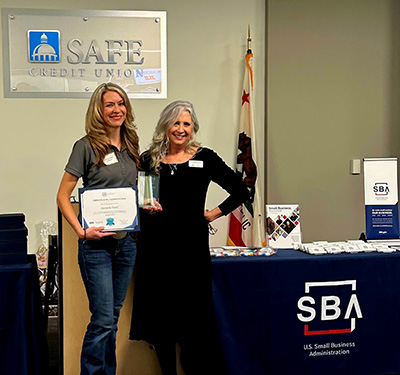 Mountain Aerial Technician's Amanda Stahl receives T.H.R.I.V.E. certificate from Sacramento District SBA Director Heather Luzzi